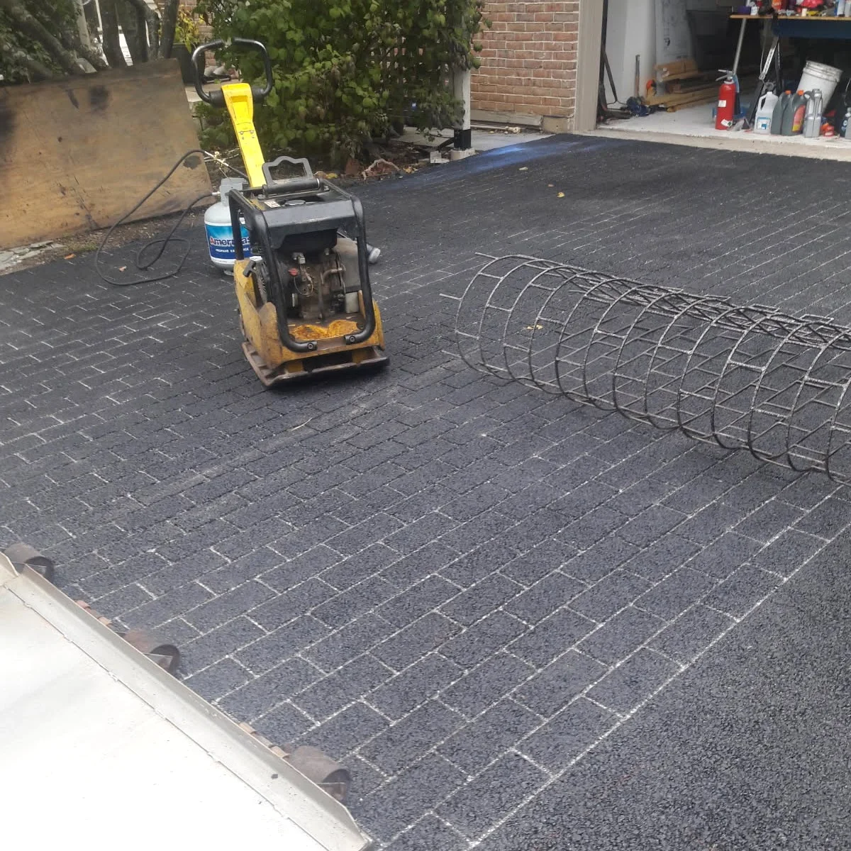 Decorative stamped asphalt surface