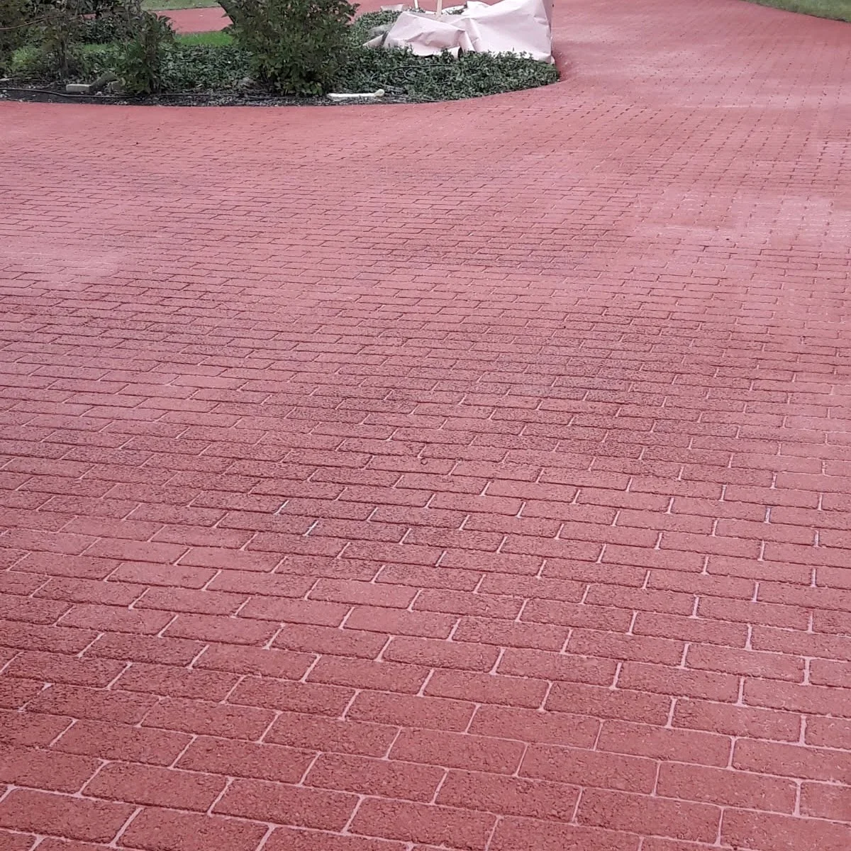 Red decorative stamped asphalt surface